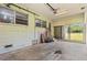 Enclosed garage with multiple windows offering an abundance of natural light at 815 31St W Ave, Palmetto, FL 34221