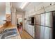 Compact kitchen design with stainless steel refrigerator and ample storage at 815 31St W Ave, Palmetto, FL 34221