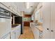 Functional kitchen with black appliances and white cabinetry at 815 31St W Ave, Palmetto, FL 34221