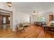 Bright living room featuring hardwood floors and a ceiling fan at 815 31St W Ave, Palmetto, FL 34221