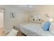 Comfortable bedroom featuring a spacious closet and a ceiling fan for a blend of convenience and comfort at 1000 Riverside Dr # B202, Palmetto, FL 34221