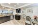 Bright kitchen with stainless steel appliances, granite countertops, and a view to the living room at 1000 Riverside Dr # B202, Palmetto, FL 34221