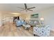 Spacious living area that includes living and dining areas with a marina view at 1000 Riverside Dr # B202, Palmetto, FL 34221