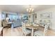 Open-concept living area with dining and living spaces; views of the marina at 1000 Riverside Dr # B202, Palmetto, FL 34221