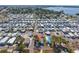 Community aerial view with marker shows location of street, housing, and landscaping at 10315 Cortez W Rd # 24-5, Bradenton, FL 34210