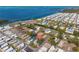 Picturesque aerial view of waterfront community with serene blue waters and meticulously maintained homes and landscaping at 10315 Cortez W Rd # 24-5, Bradenton, FL 34210