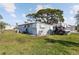Well-maintained yard with boat and trailer, offering ample space and convenience for outdoor activities at 10315 Cortez W Rd # 24-5, Bradenton, FL 34210