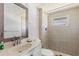 Modern bathroom design with tiled shower and vanity at 10315 Cortez W Rd # 24-5, Bradenton, FL 34210
