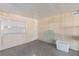 Empty bedroom reveals aged walls and outdated features at 10315 Cortez W Rd # 24-5, Bradenton, FL 34210