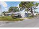 A cozy home with adjacent boat parking, enhanced by a beautiful mature tree at 10315 Cortez W Rd # 24-5, Bradenton, FL 34210