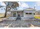 Charming single-story home with well-maintained landscaping and a welcoming front porch area at 10315 Cortez W Rd # 24-5, Bradenton, FL 34210