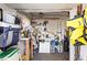 A messy storage area featuring various tools, fishing rods, life vest and equipment at 10315 Cortez W Rd # 24-5, Bradenton, FL 34210