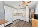 Efficient kitchen with white appliances and ample cabinet space, designed for easy meal preparation at 1307 41St E Ave, Ellenton, FL 34222