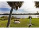 Relax and enjoy lake views from park benches on the community property at 1307 41St E Ave, Ellenton, FL 34222