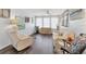 Bright living room with neutral colors, hardwood floors, and plenty of natural light at 1307 41St E Ave, Ellenton, FL 34222