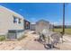 View of the patio with storage shed and outdoor seating at 1307 41St E Ave, Ellenton, FL 34222