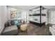 Stylish bedroom features a gray sofa and unique bunk beds at 135 Grant Dr, Sarasota, FL 34236