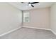 Bedroom featuring plush carpeting, and a window at 14914 15Th E St, Parrish, FL 34219