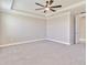 Bright bedroom featuring plush carpeting, a ceiling fan, and neutral paint at 14914 15Th E St, Parrish, FL 34219