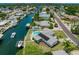 Aerial view of waterfront homes, canals, and a scenic coastal neighborhood at 201 Bay N Dr, Bradenton Beach, FL 34217