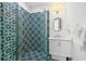 Stylish bathroom featuring modern fixtures, patterned tile and a glass shower enclosure at 201 Bay N Dr, Bradenton Beach, FL 34217