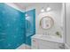 Bathroom featuring a modern vanity and a shower with unique tile at 201 Bay N Dr, Bradenton Beach, FL 34217