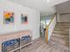 Hallway area with decor, a ping pong table and a staircase at 201 Bay N Dr, Bradenton Beach, FL 34217