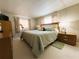 Cozy bedroom offers neutral tones, large windows, and ample closet space at 2107 Palma Sola Blvd # 95, Bradenton, FL 34209