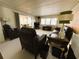 Comfortable living room with lots of natural light and plush carpeting at 2107 Palma Sola Blvd # 95, Bradenton, FL 34209