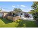 The outdoor space is ready for entertaining with a patio, grill and golf cart! at 2202 Alpine Ave, Sarasota, FL 34239