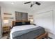 Well-lit bedroom with a cozy bed, wood accents, and ample closet space at 2202 Alpine Ave, Sarasota, FL 34239