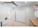 Spacious closet with multiple doors, built-in drawers, and a plush rug in a bright room at 2202 Alpine Ave, Sarasota, FL 34239