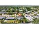 Aerial view of a charming home with a well-maintained yard in a quiet neighborhood at 2307 Valencia Dr, Sarasota, FL 34239