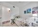 Cozy bedroom featuring one twin bed, seashell bedding, and plenty of natural light at 2307 Valencia Dr, Sarasota, FL 34239