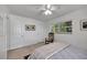 Bright bedroom with a window, door and ceiling fan at 2307 Valencia Dr, Sarasota, FL 34239