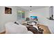 Cozy living room featuring a large window with blinds and comfortable seating at 2307 Valencia Dr, Sarasota, FL 34239