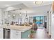 Open concept kitchen and living area with lake views and modern furnishings at 308 Timber Lake Dr, Bradenton, FL 34210