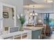 Open-concept living space with views of lake from the kitchen at 308 Timber Lake Dr, Bradenton, FL 34210
