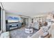 Stylish living room that offers a view of lake; neutral colors and coastal decor at 308 Timber Lake Dr, Bradenton, FL 34210