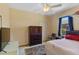 Comfortable bedroom with carpeting, closet, and window providing natural light at 3108 River Woods Dr, Parrish, FL 34219