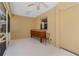 Covered patio with white flooring and a seating area at 3108 River Woods Dr, Parrish, FL 34219