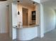 Stylish bar area with counter space, sink, and wine rack at 3375 Juniper Springs St, Wesley Chapel, FL 33543