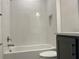 Bathroom showcasing white subway tile, modern fixtures, and sleek vanity for a clean, contemporary feel at 3375 Juniper Springs St, Wesley Chapel, FL 33543