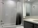 Bright bathroom featuring white subway tile in shower, modern vanity with a sink and stainless fixtures at 3375 Juniper Springs St, Wesley Chapel, FL 33543