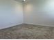 A bright bedroom with neutral walls, plush carpet, and ample natural light. Ready for your personal touch at 3375 Juniper Springs St, Wesley Chapel, FL 33543