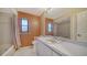 Bathroom featuring a single sink vanity, tub with shower, and good lighting at 3572 Ferndell, Sarasota, FL 34235