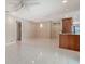 Spacious living room with tile flooring, recessed lighting, and a ceiling fan for a comfortable and modern living experience at 3572 Ferndell, Sarasota, FL 34235