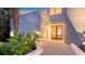 Inviting front entrance featuring a unique architectural design and lush landscaping at 360 N Washington Dr, Sarasota, FL 34236