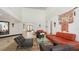 Spacious living room features high ceilings and ample seating, perfect for entertaining or relaxing at 360 N Washington Dr, Sarasota, FL 34236