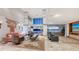 Elegant living room with water views and plush seating, perfect for relaxation and entertaining at 360 N Washington Dr, Sarasota, FL 34236